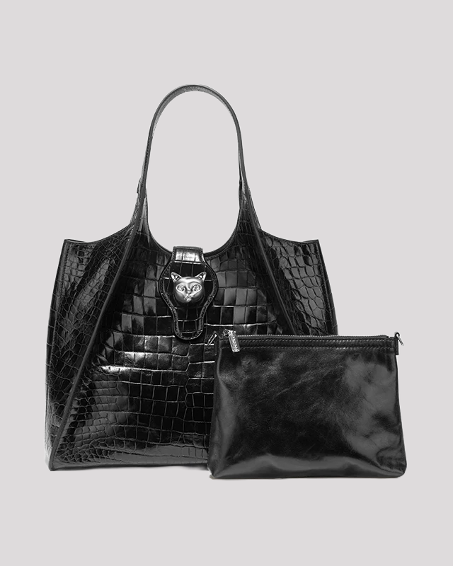 Black croc-embossed tote bag by Bafelli with silver cat clasp, shown with matching leather pouch