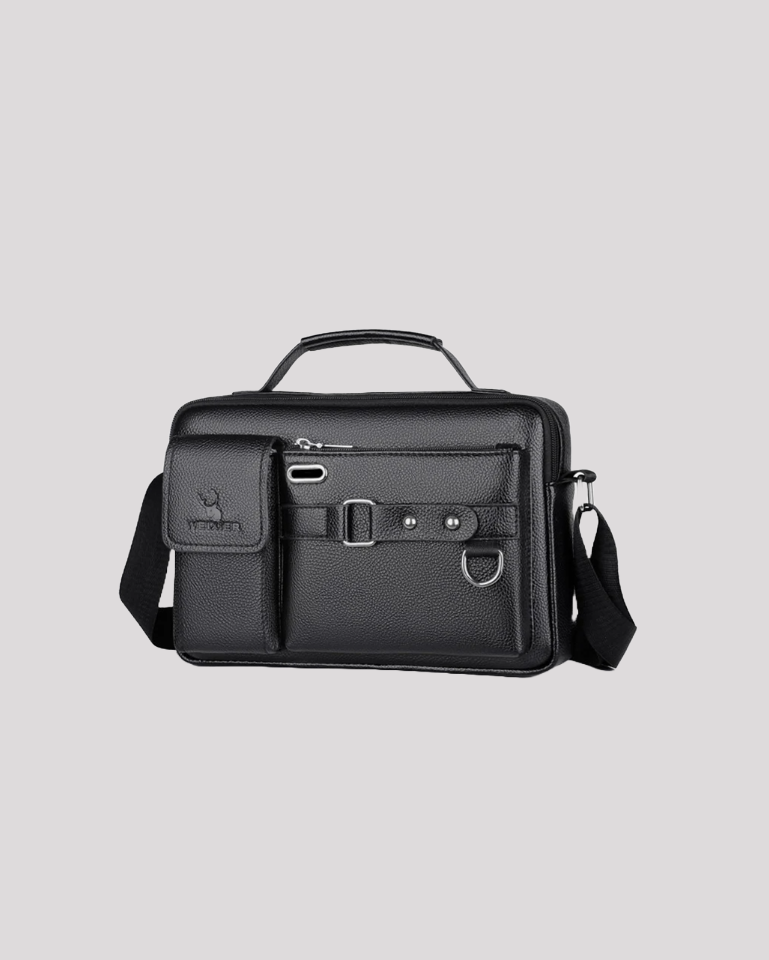 Angled view of black leather messenger bag with handle and shoulder strap