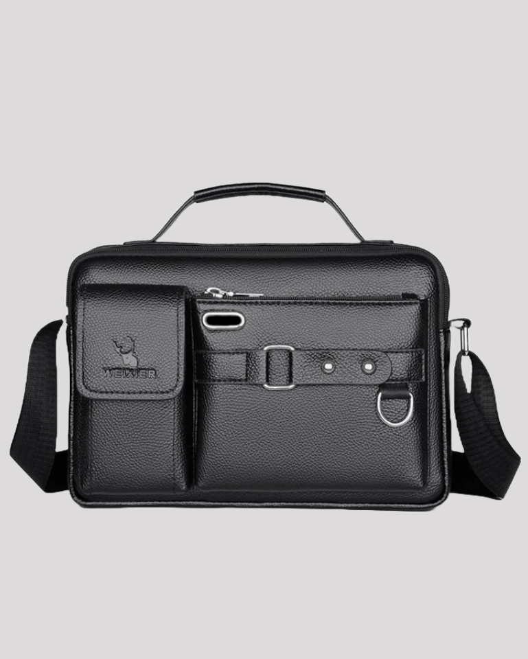 Black leather messenger bag with front pockets, buckle strap, and shoulder strap – front view