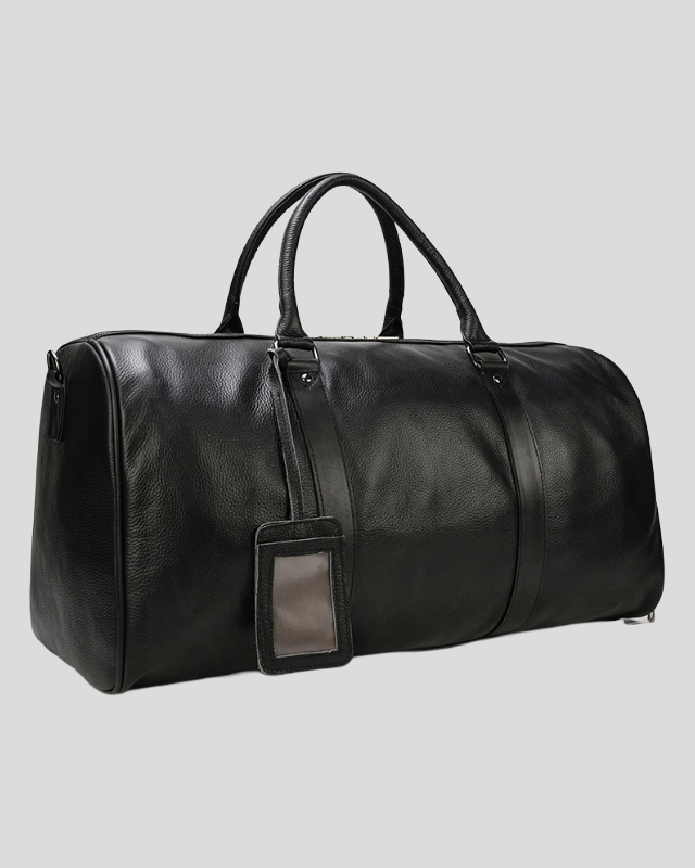 Black leather travel duffel bag with detachable shoulder strap – side angle