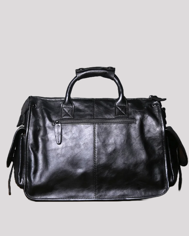 Back view of black vintage leather messenger bag with zipper pocket and smooth leather finish