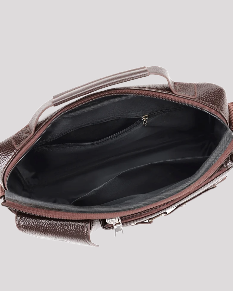 Open top view of brown leather messenger bag – spacious interior with zipper pocket