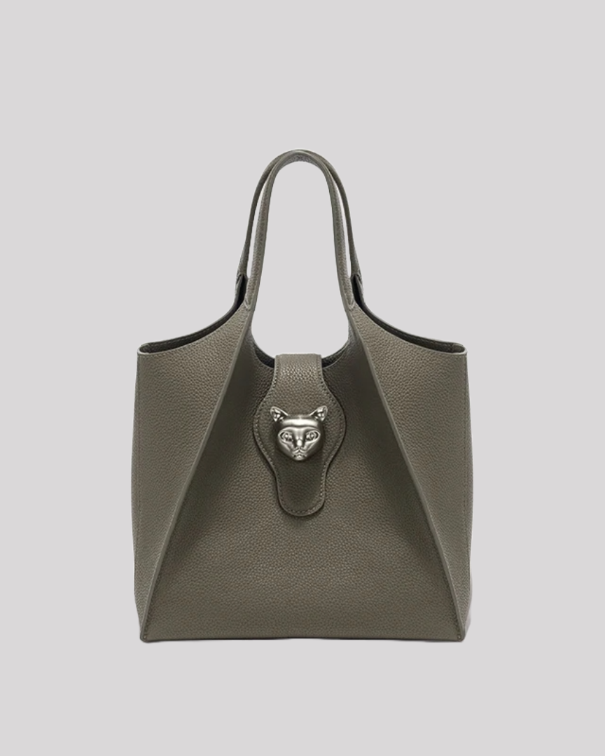 Front view of olive green leather tote bag by Bafelli with textured surface and silver cat emblem clasp