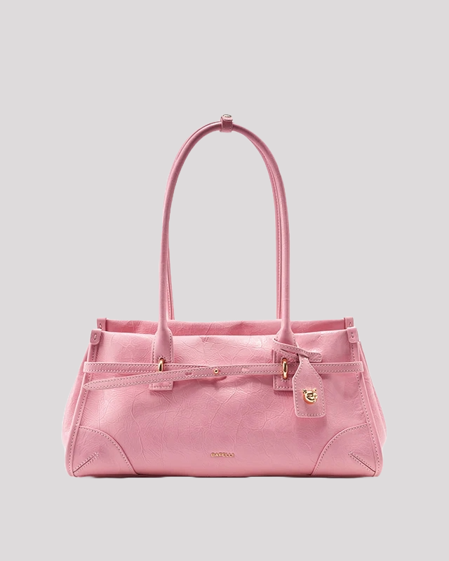 Elegant pink leather shoulder bag by Bafelli with gold lock charm – front view