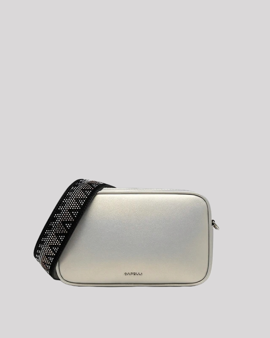 Front view of metallic silver crossbody bag by Bafelli with black crystal-studded strap and Bafelli logo