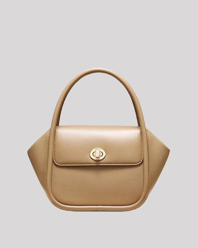Front view of taupe structured leather handbag by Bafelli with gold turn-lock closure and smooth finish
