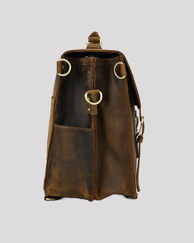 Vintage brown leather messenger bag with side pocket and rings