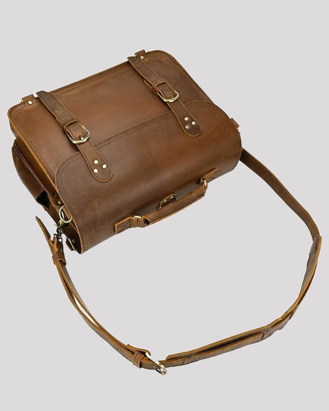 Vintage mocha leather messenger bag with adjustable shoulder strap – angled view