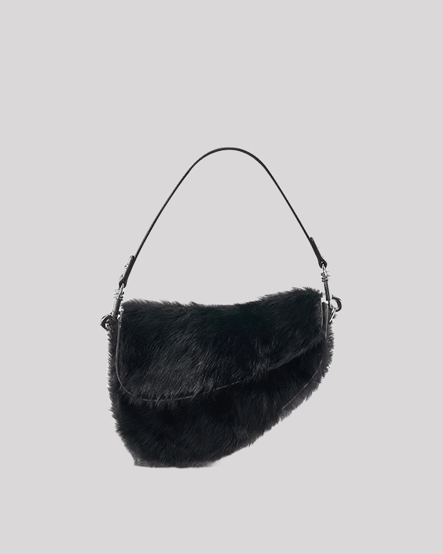 Front view of black faux fur shoulder bag by Bafelli with curved flap and short leather strap