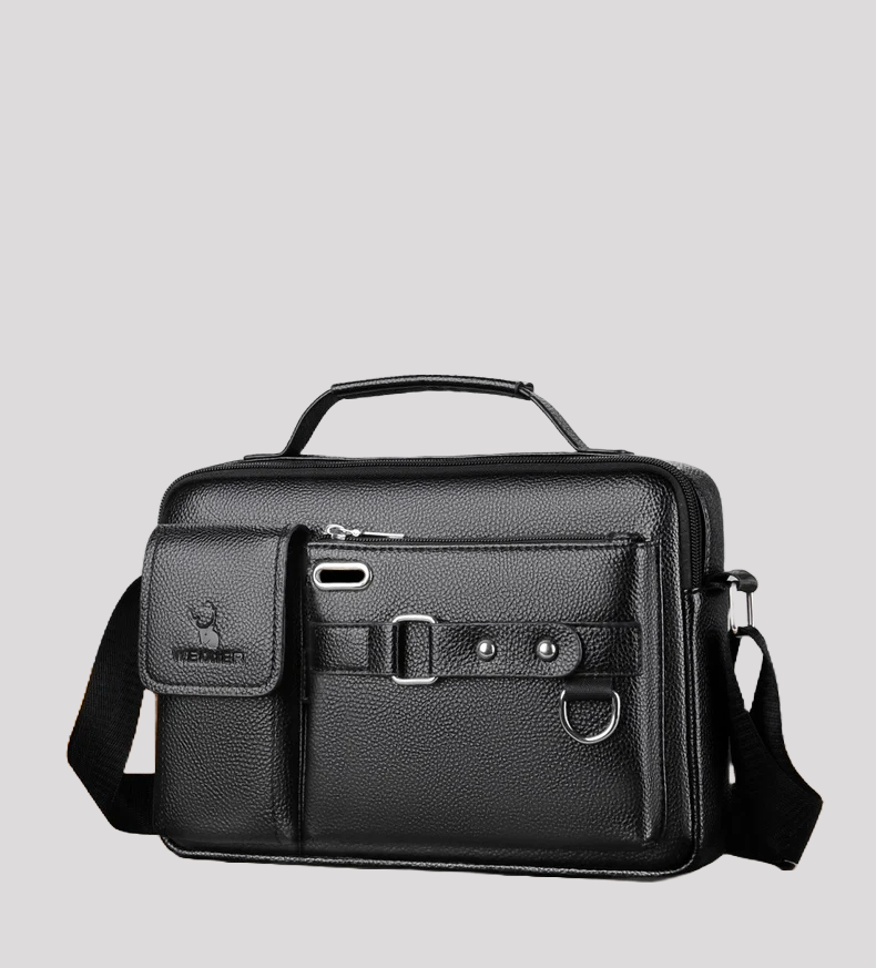 Close-up of black leather messenger bag front with buckle, strap, and zipper pocket