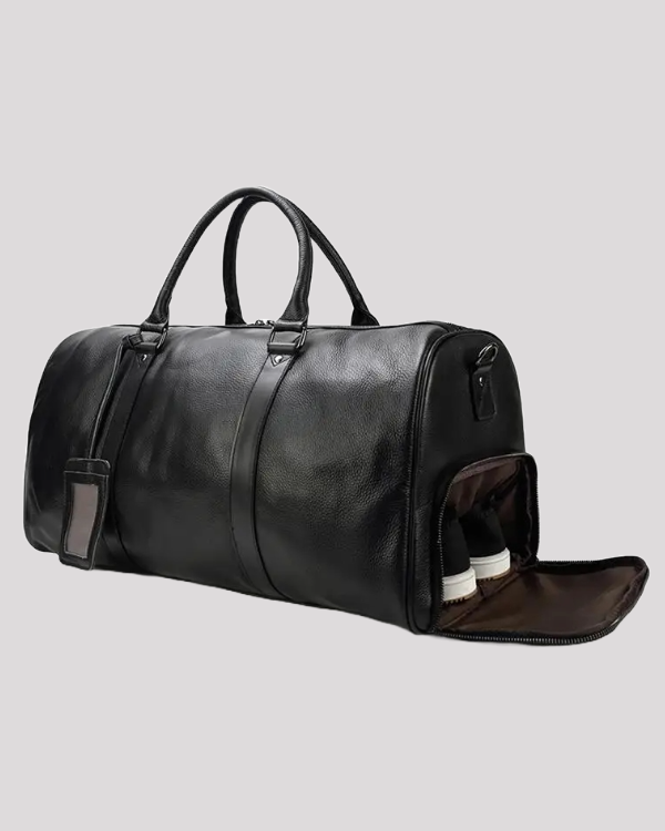 Black leather travel duffel bag with dedicated shoe compartment – open view