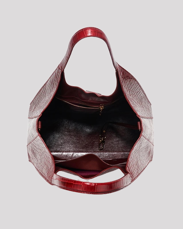 Interior view of burgundy crocodile embossed tote bag by Bafelli with spacious compartments and zip pocket