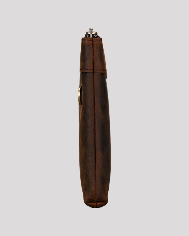 Slim side profile of dark brown leather clutch bag
