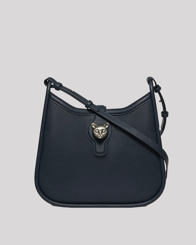 Front view of dark charcoal leather shoulder bag by Bafelli with silver cat head clasp and adjustable strap