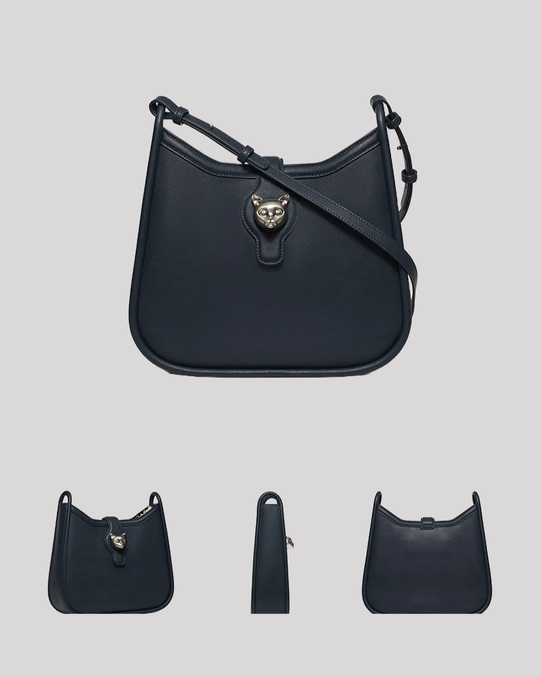 Side angle of dark charcoal leather shoulder bag by Bafelli showing structured silhouette and elegant finish