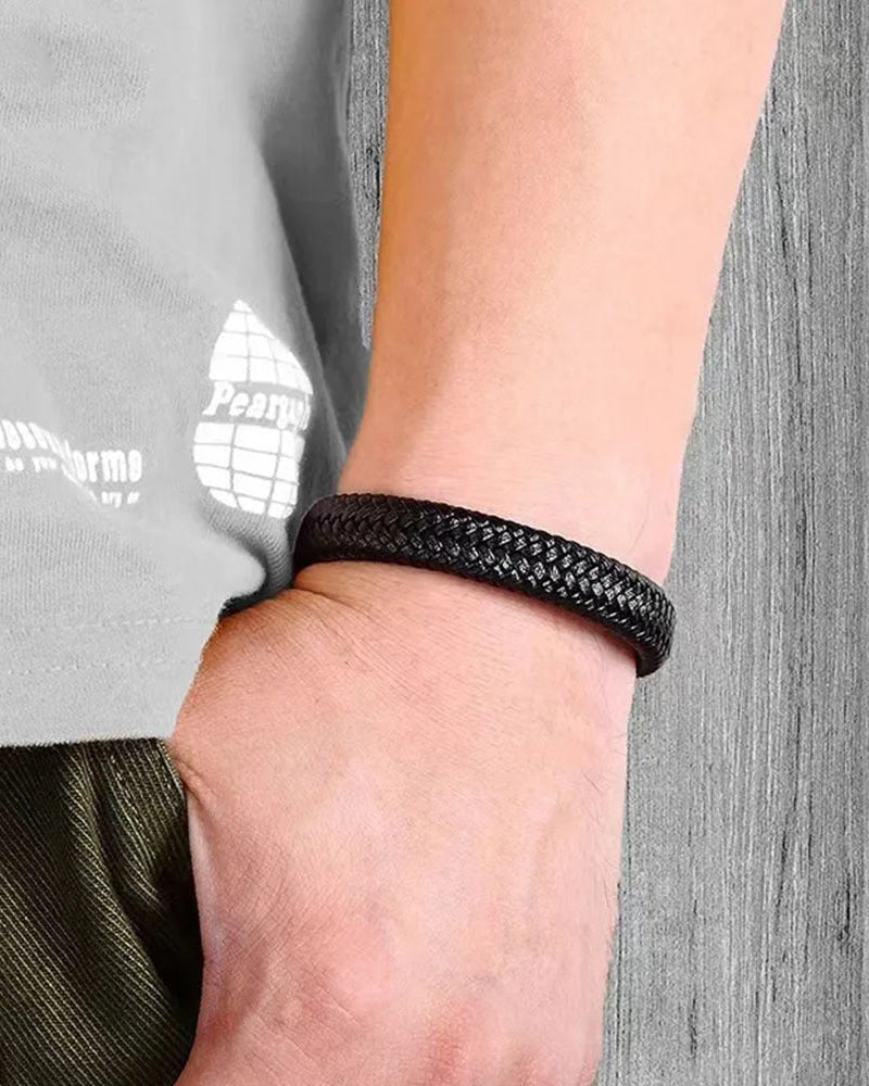 Men’s black leather bracelet styled with casual outfit – braided design accessory
