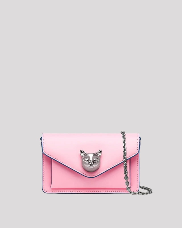 Front view of pink envelope crossbody bag by Bafelli with silver cat head detail and chain strap
