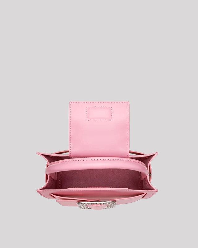 Interior view of pink top-handle bag by Bafelli with spacious compartment and magnetic flap closure