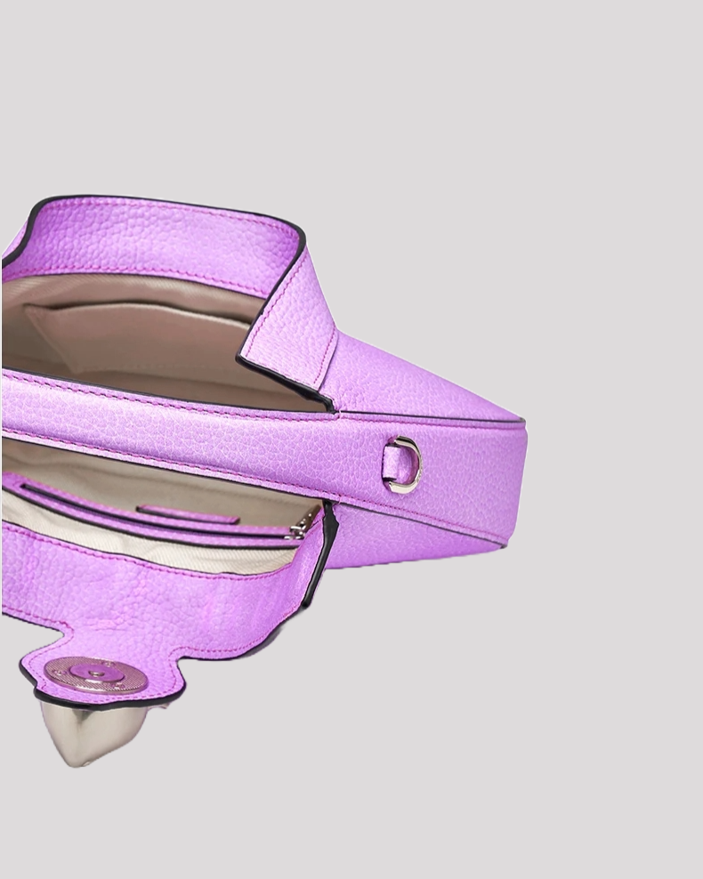 Open purple leather hobo bag by Bafelli showing spacious beige interior with magnetic closure