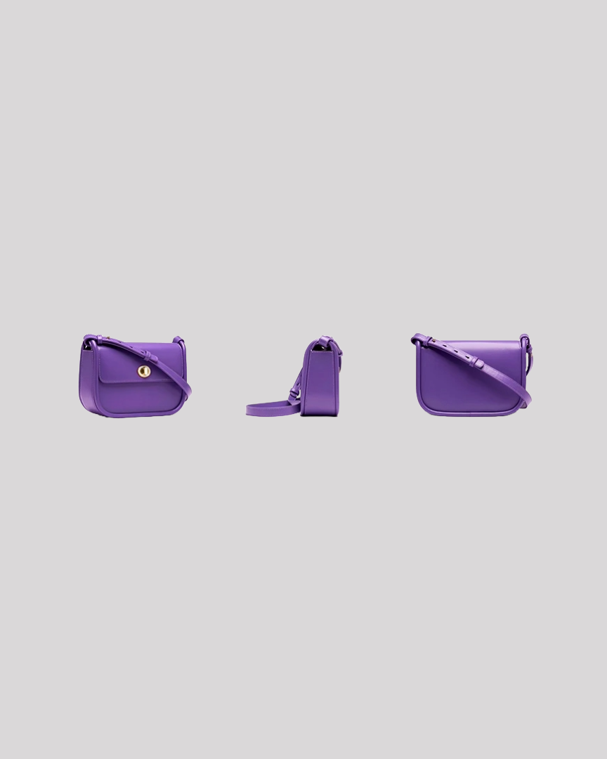 Side profile of sleek purple leather shoulder bag by Bafelli with adjustable strap