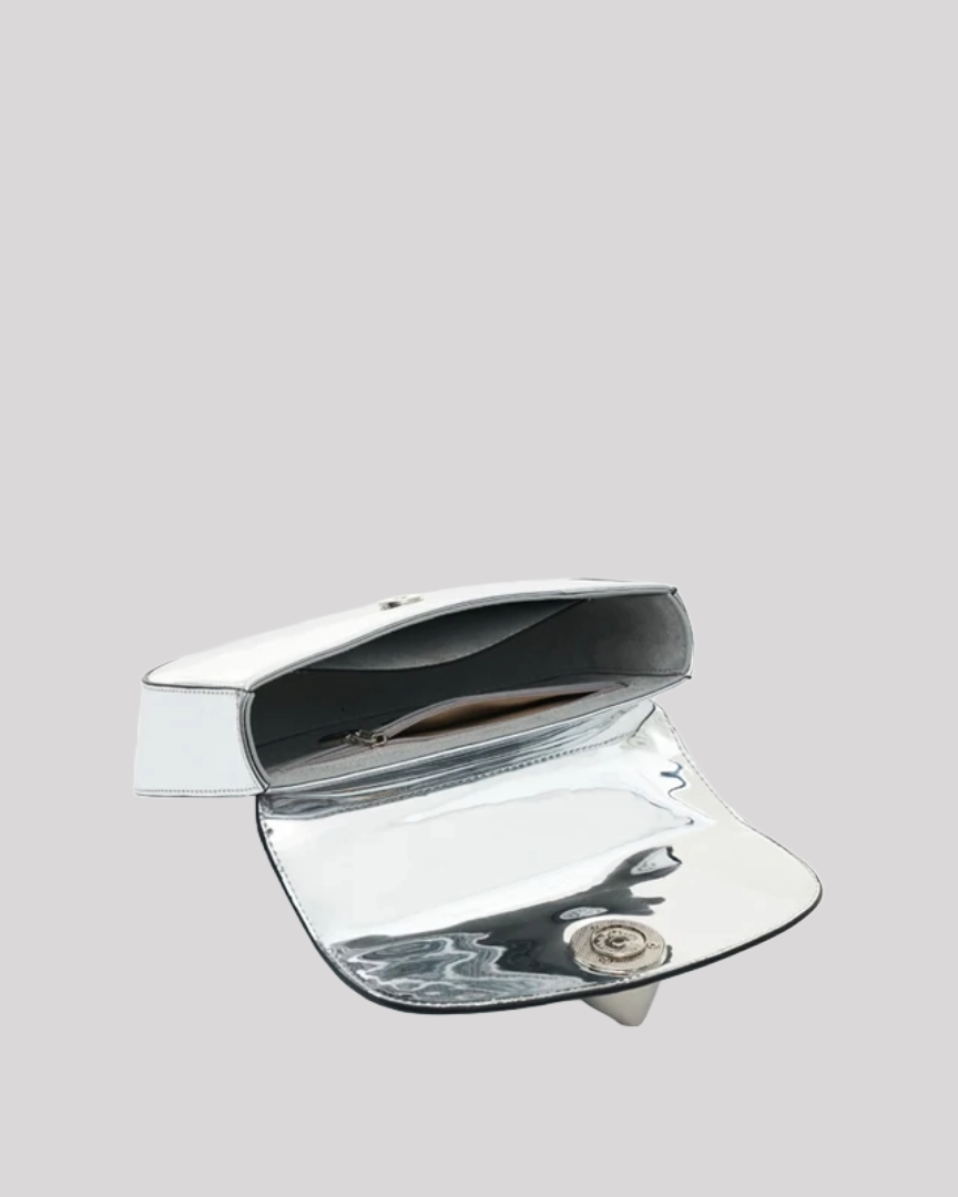 Open view of silver metallic handbag by Bafelli showing interior compartments