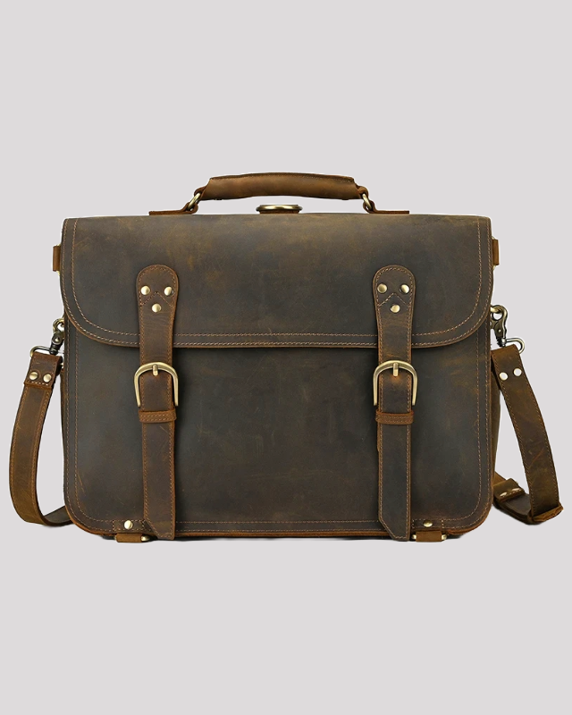 Vintage brown leather messenger bag with brass buckles – front view