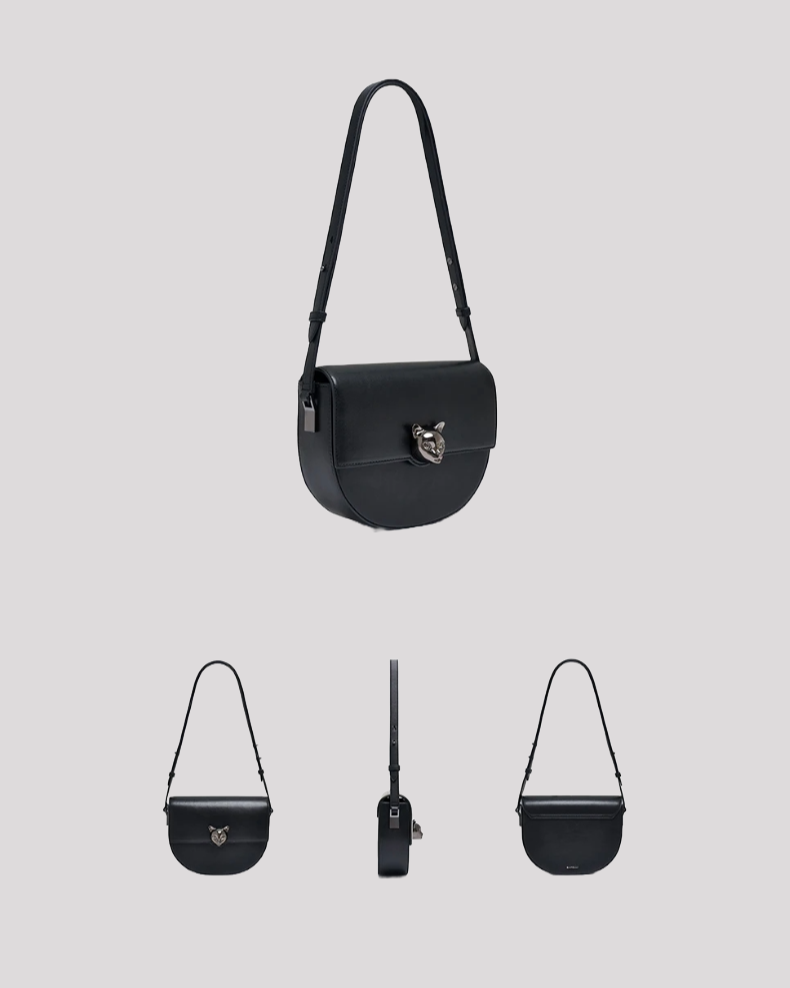 Women’s black leather crossbody bag by Bafelli – angled view, front view, side view and back view with cat head clasp detail
